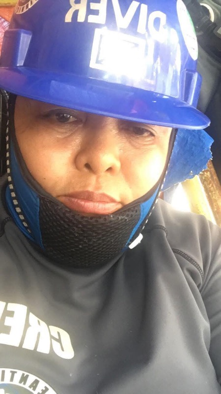 Intense close-up of diver wearing DIVER helmet